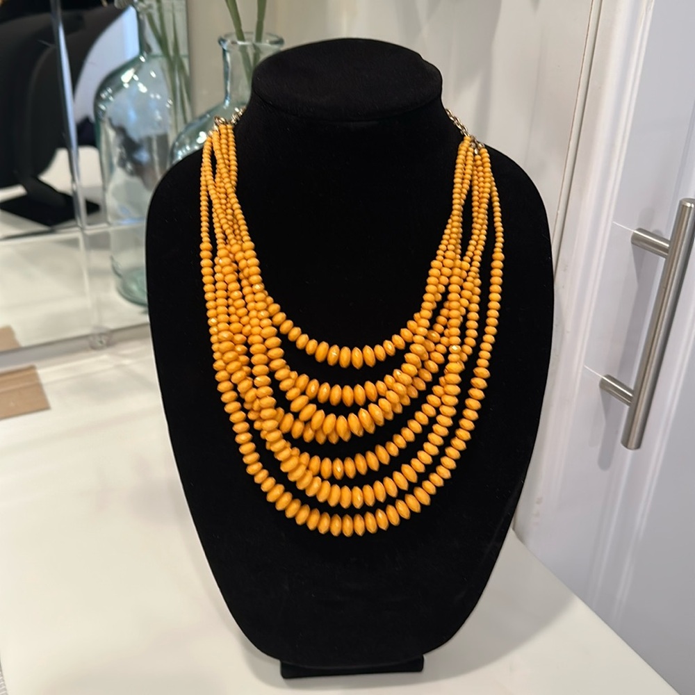 Fun yellowish gold beaded multi-strand necklace